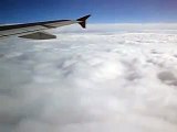 Plane flying over the clouds