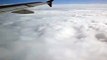 Plane flying over the clouds