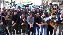 Syrians in rebel-held areas stage anti-Assad protests