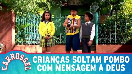 Crianças soltam pombo com mensagem a Deus