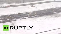 Aerial Footage Helicopters fly over FlyDubai FZ981 crash site in Rostov-on-Don