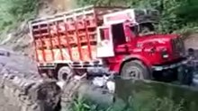 Graphic content Truck falls off cliff due to land slide [Low, 360p]