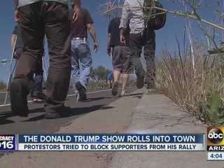 Trump supporters hike to rally in the Valley