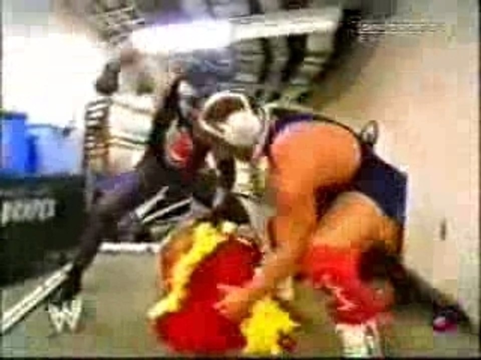 Undertaker and Kurt Angle beat Hulk Hoggan