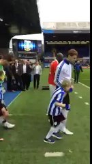 10 years ago our family was told my little boy would never walk. Look at him now leading out Sheffield Wednesday