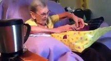 tender reaction of an elderly woman to receive a gift