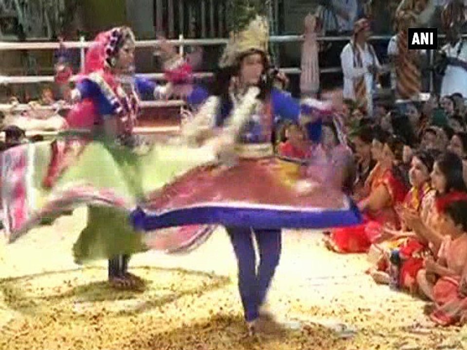 Devotees play 'Flower Holi' in pink city
