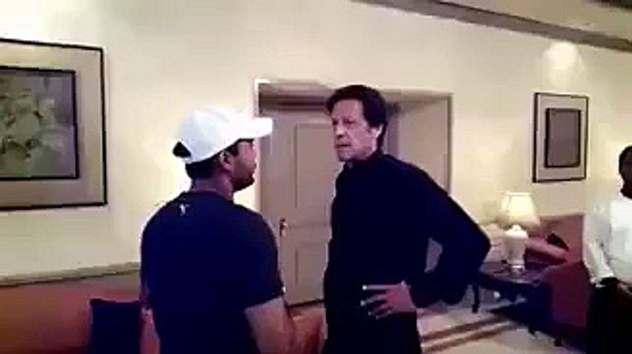 Umar Akmal talking to IMRAN KHAN