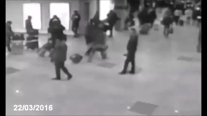 Footage shows the moment explosions hit Brussels airport