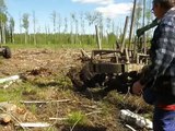Belarus Mtz 82 stuck in deep mud, extreme conditions in wet forest