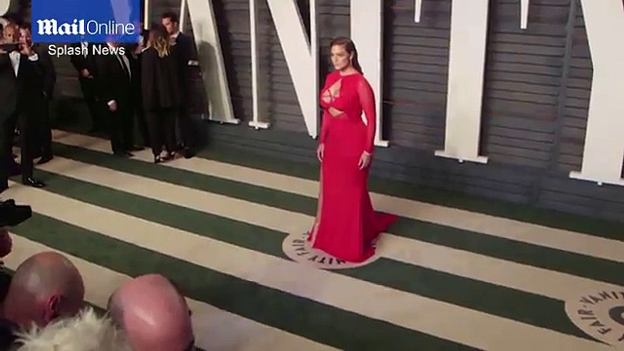 Ashley Graham rocks black distressed jeans with a leather jacket