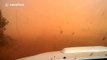 Dramatic footage of a dust storm engulfing a car in South Africa