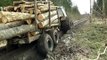 Belarus Mtz 1025 forestry tractor in mud, difficult road, extreme mud conditions