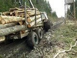 Belarus Mtz 1025 forestry tractor in mud, difficult road, extreme mud conditions