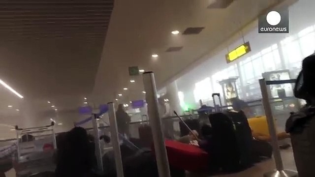 SENSITIVE: Inside smoke-filled Brussels airport, panic immediately after blast