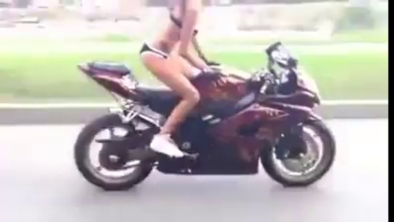 Young Beautiful Girl Bike Riding With her Boy Friend