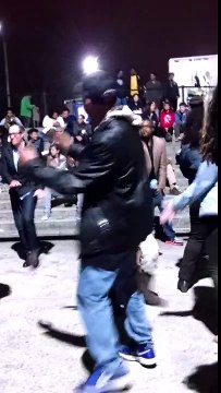 Old guy dancing at outdoor music venue has great moves!