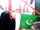 Pakistani flags hoisted in occupied Kashmir -23 March 2016