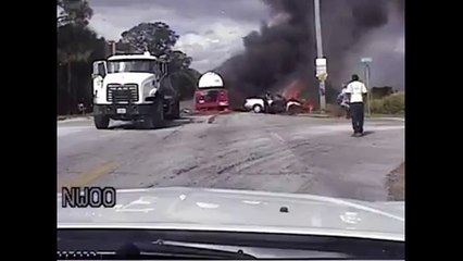 Deux officiers héroïques sauvent une femme prise au piège de sa voiture en feu
