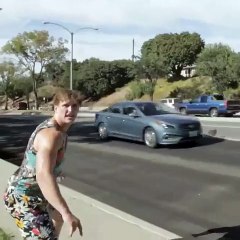 Acrobatic saving of a cat on the road