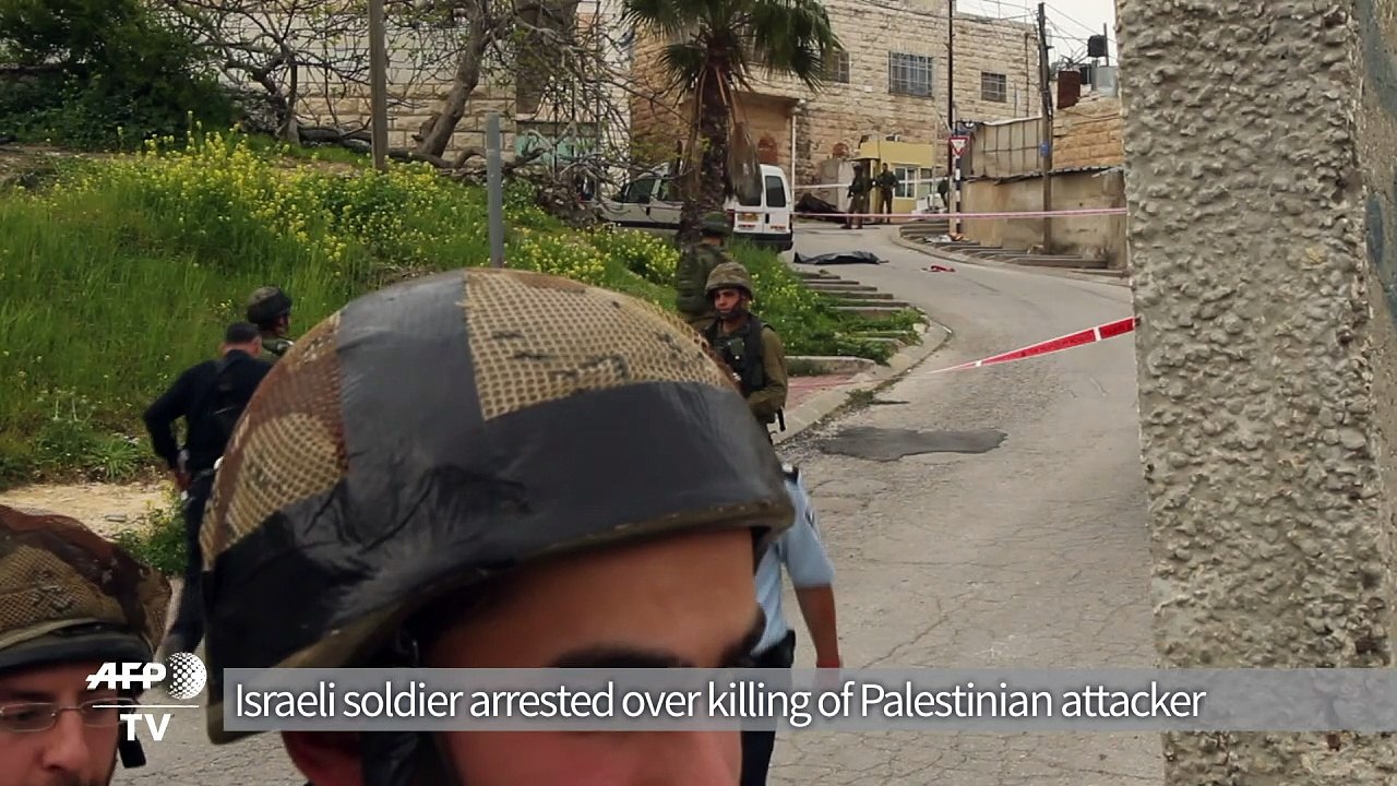 Israel soldier stabbed, two Palestinian attackers shot dead