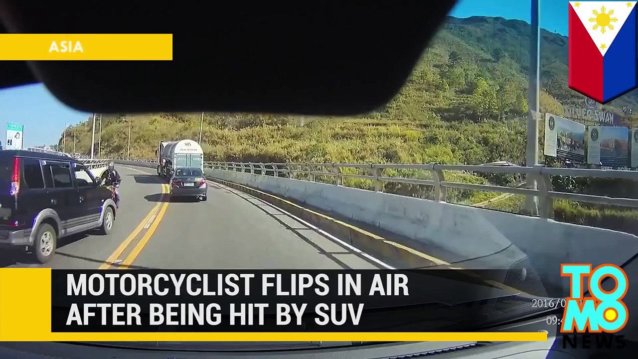 Motorcycle accident: Motorcyclist flips in air after head on collision with SUV TomoNews