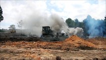 Dozer Pushing Off Ashes