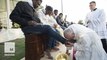 Pope kisses feet of Muslim refugees, says, 'We are brothers'