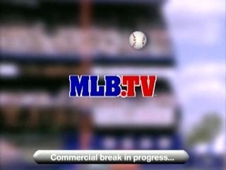 Kellie singing at the Mariners/Cubs game