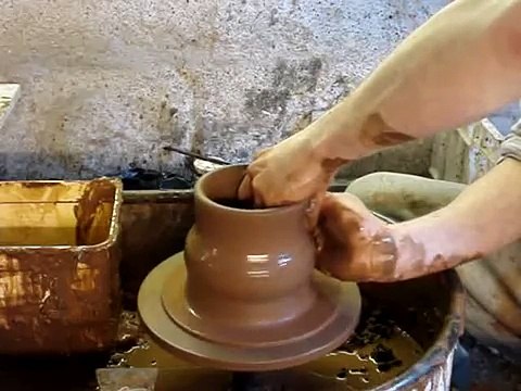 Making an Olla plant self watering clay pot on the potters