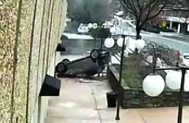 Car Falls From 4th Floor of Parking Garage