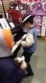 Kid randomly plays piano in toy store, blows everyone
