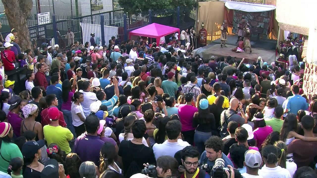 Catholics take part in Good Friday procession in Venezuela slum