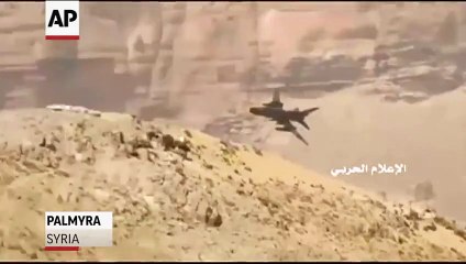 Syrian video shows battle for Palmyra.