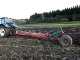 New Holland TM 175 ploughing