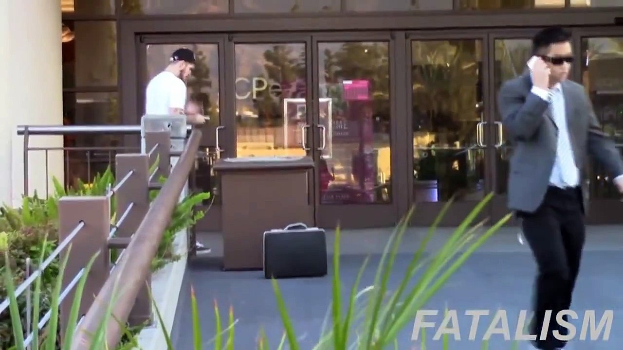 Dropping BOMB Briefcase Front Of People and they Took it - Mafia Prank 2014