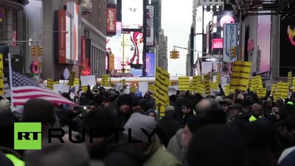 Anti-Saudi protesters rally at Times Square to decry execution of Sheikh Al-Nimr