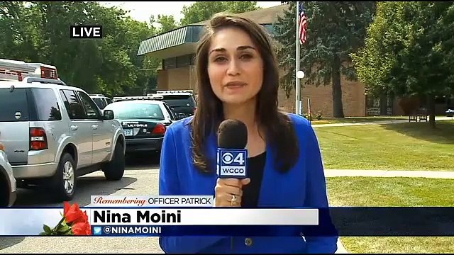 Thousands Honor Fallen Officer At Funeral