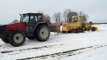 Grader stuck in mud, Valtra 8150 trying to help