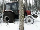 Belarus Mtz 1025 forestry tractor stuck in mud, difficult conditions