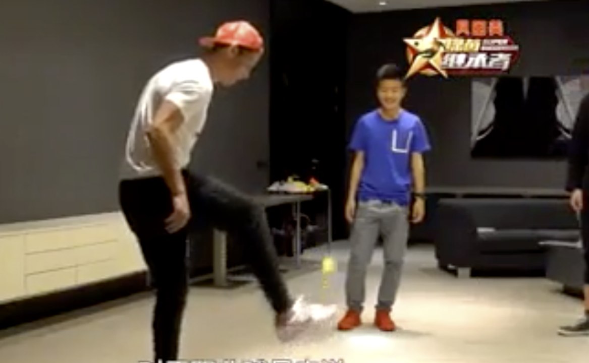 Cristiano Ronaldo shows off his keepy-uppy tennis ball skills on a Chinese TV show
