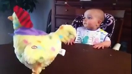 This adorable baby can't contain herself when watching where eggs come from!