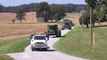 John Deere Combines and Tractors on the Move During Corn Harvest