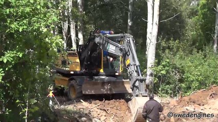 Volvo EW160B digging a trench