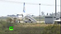 Moment EgyptAir crew member escapes hijacked plane through cockpit window