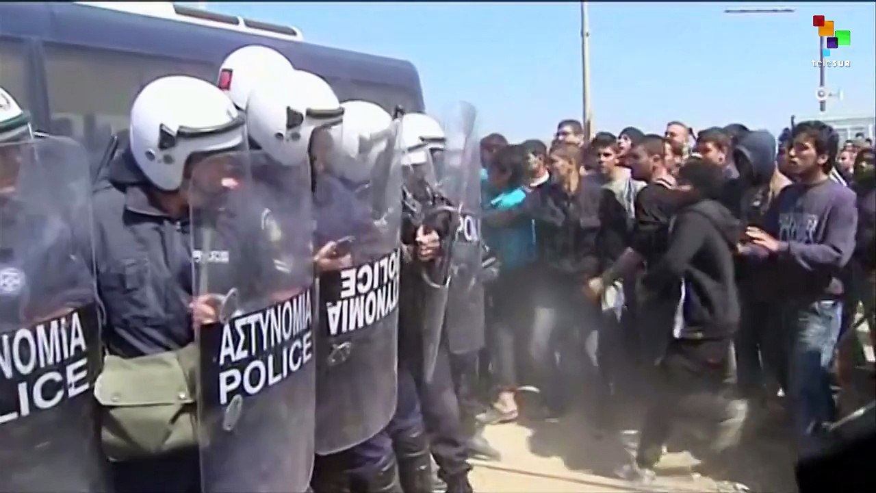 Police Clash with Stranded Refugees at Greek Bo...