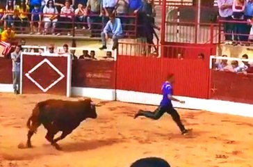 Bull Destroys Idiot That Runs Through The Arena