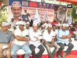 AAP workers shave heads in protest, demand Lokayukta s empowerment in Karnataka