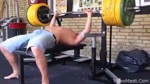 Heavyweight body builder lifting a weight watch this video its very interesting