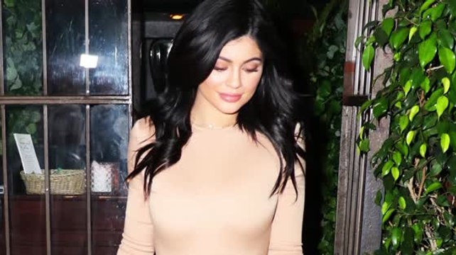 Kylie Jenner Wows in Nude Bodysuit and Sheer Skirt